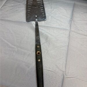 Vintage Flint Stainless Steel Slotted Turner with Black Handle
